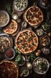 Table full of different types of pizza. Pizza party for friends or family. A lot of Fast, high calorie unhealthy food. Italian cuisine concept.
