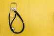© Светлана Назарова - Stethoscope on yellow background and space for text, medical equipment for banner