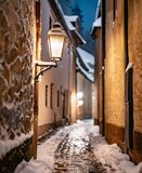 Fototapeta Fototapeta uliczki - Narrow cobbled lantern streets on winter season