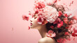 Beautiful woman with pink flowers in her hair.