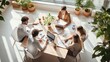 business people or coworkers gathered around a table working