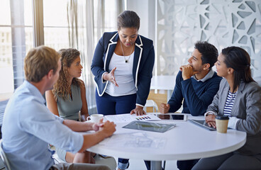 Fototapete - Business people, meeting and discussion in office for planning, collaboration and documents. Employees, men or women at corporate workplace with communication, brainstorming or hand gesture at table