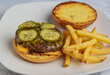  cheese burger top with pickles and relish  served with fries