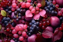  A Close Up Of A Bunch Of Grapes And Grapes With Leaves On The Top Of The Grapes And The Bottom Of The Grapes On The Bottom Of The Image.