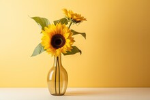  A Vase With Two Sunflowers In It Sitting On A Table Next To A Yellow Wall And A Yellow Wall.