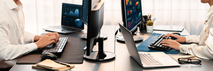 Poster - analyst working on data analysis or bi dashboard on computer monitor. business team analyzing financ