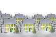 Digital png illustration of cottages with snow and christmas lights on transparent background