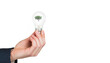 Digital png illustration of hand holding bulb with tree on transparent background
