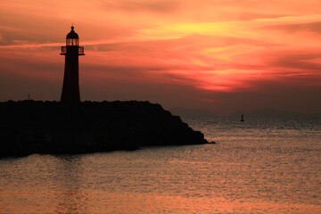 Wall Mural - lighthouse at sunset