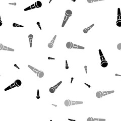 Poster - Seamless vector pattern with microphone symbols, creating a creative monochrome background with rotated elements. Illustration on transparent background