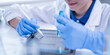 © Supapich - Woman scientist person research writing document science study datum in modern laboratory, professional female doctor working on medical test lab note report health technology development analysis