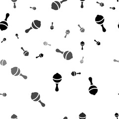 Poster - Seamless vector pattern with baby rattle symbols, creating a creative monochrome background with rotated elements. Vector illustration on white background