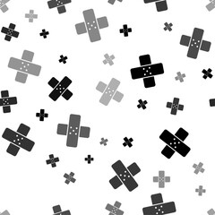 Poster - Seamless vector pattern with adhesive plaster symbols, creating a creative monochrome background with rotated elements. Vector illustration on white background