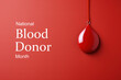 January national blood donor month concept. Pendant drop of blood and text on a red background, poster