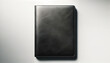 © Who is Danny - Minimalist black leather notebook cover mockup on a bright background. Design simplicity. Generative AI
