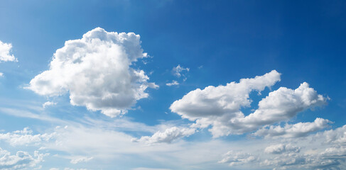 Wall Mural - Large white clouds. Sky with fluffy white cloudscape texture. Wide blue sky nature background, cloudy, horizontal