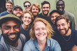© lensofcolors - Selfie of smiling blonde woman in close-up next to her fellow workers. Concept of working women's rights and salary equalization. Generative AI