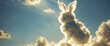 Bunny shaped fluffy clouds with bright light rays in the sky