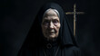 © vladzelinski - An old nun in black clothes