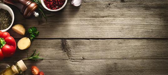 Poster - Menu background. Spices and ingredients for cooking food on a wooden table top view