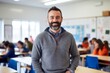 © CogniLens - Portrait of a grinning man in his 40s wearing a thermal fleece pullover against a lively classroom background. AI Generation