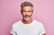 © CogniLens - Portrait of a satisfied man in his 50s donning a trendy cropped top against a pastel or soft colors background. AI Generation