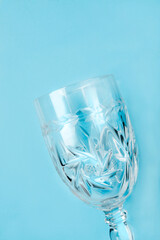 Wall Mural - Wineglass on blue background