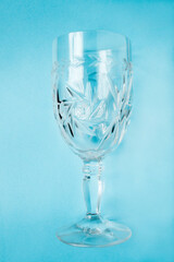 Canvas Print - Wineglass on blue background