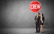 © ra2 studio - Young business person holding road sign
