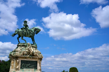 Wall Mural - Green copper statue of a rider on a horse overlooking the city of Budapest, Hungary.