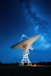 © Stavros - Huge radio telescope aimed directly into sky in middle of deserted desert catching signals. Large modern radio telescope aimed at sky catches signals and transmits to scientists for recognition