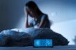 Anxiety disorder on insomnia woman concept, sleepless Woman open eye awakening on the bed at night time can't sleep from symptom of depression diseased.