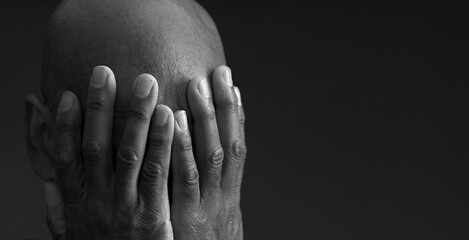 man praying to god on gray black background with people stock image stock photo