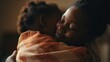 African mother kisses and hugs her baby, blurred kids room. Mother's day concept.
