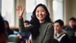 © ANC Media - Portrait of an Enthusiastic Asian-American Female College Student Raising Her Hand