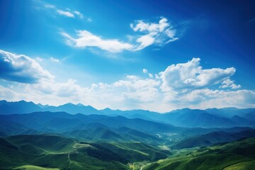 Poster -  a scenic view of a valley and mountains under a blue sky with a few clouds in the middle of the picture.