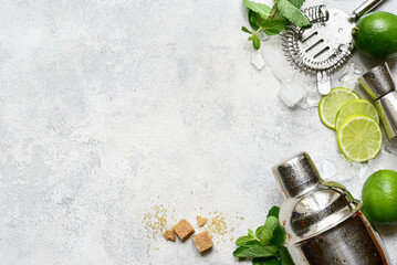 Wall Mural - Ingredients for making mojito - delicious lime cocktail with mint. Top view with copy space.