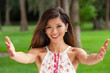 © Darren Baker - Welcoming Asian Young Woman Girl Smiling WIth Perfect Teeth Arms Open