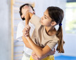 © JackF - Girls and boys learns to do power grip with trainer during a self-defense lesson in the gym