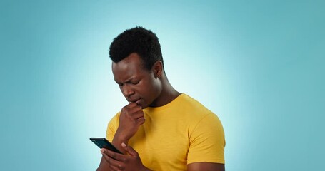 Poster - phone, stress and anxiety with an annoyed black man in studio on a blue background for communication