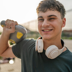 One man young teen caucasian male train with kettlebell girya weight