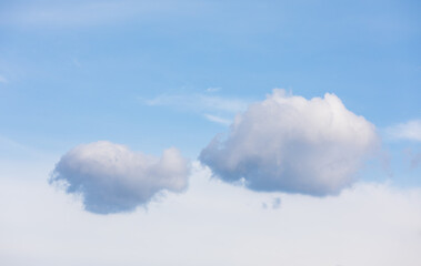 Clouds floating in the blue sky.