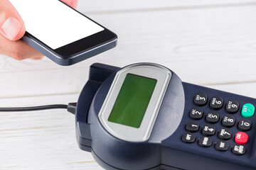 Poster - Digital png photo of hand using smartphone on payment terminal, copy space on transparent background