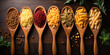 Different pasta types in wooden spoons on the table. Top view.