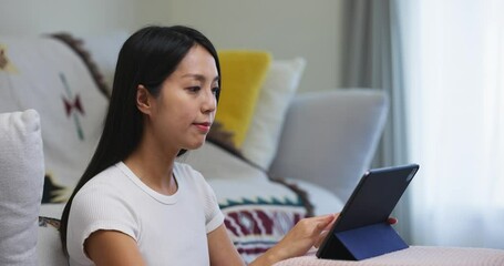 Poster - Woman use tablet computer at home