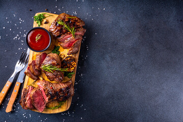 Wall Mural - Grilled beef steak with herb and spices