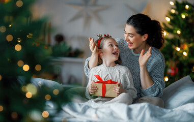 Wall Mural - family celebrating Christmas