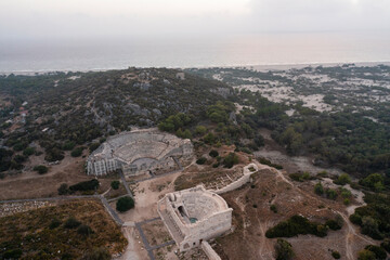 Wall Mural - Patara (Pttra). Ruins of the ancient Lycian city Patara. Amphi-theatre and the assembly hall of Lycia public. Patara was at the Lycia (Lycian) League's capital. Aerial view shooting. Antalya, TURKEY