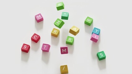 Fototapete - Closeup top view of Animation colorful words Christmas assemble on white background. 3D animation Christmas idea concept.

