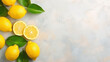 Fresh Juicy Lemons on light desk background. Top View on Light Desk with White Background